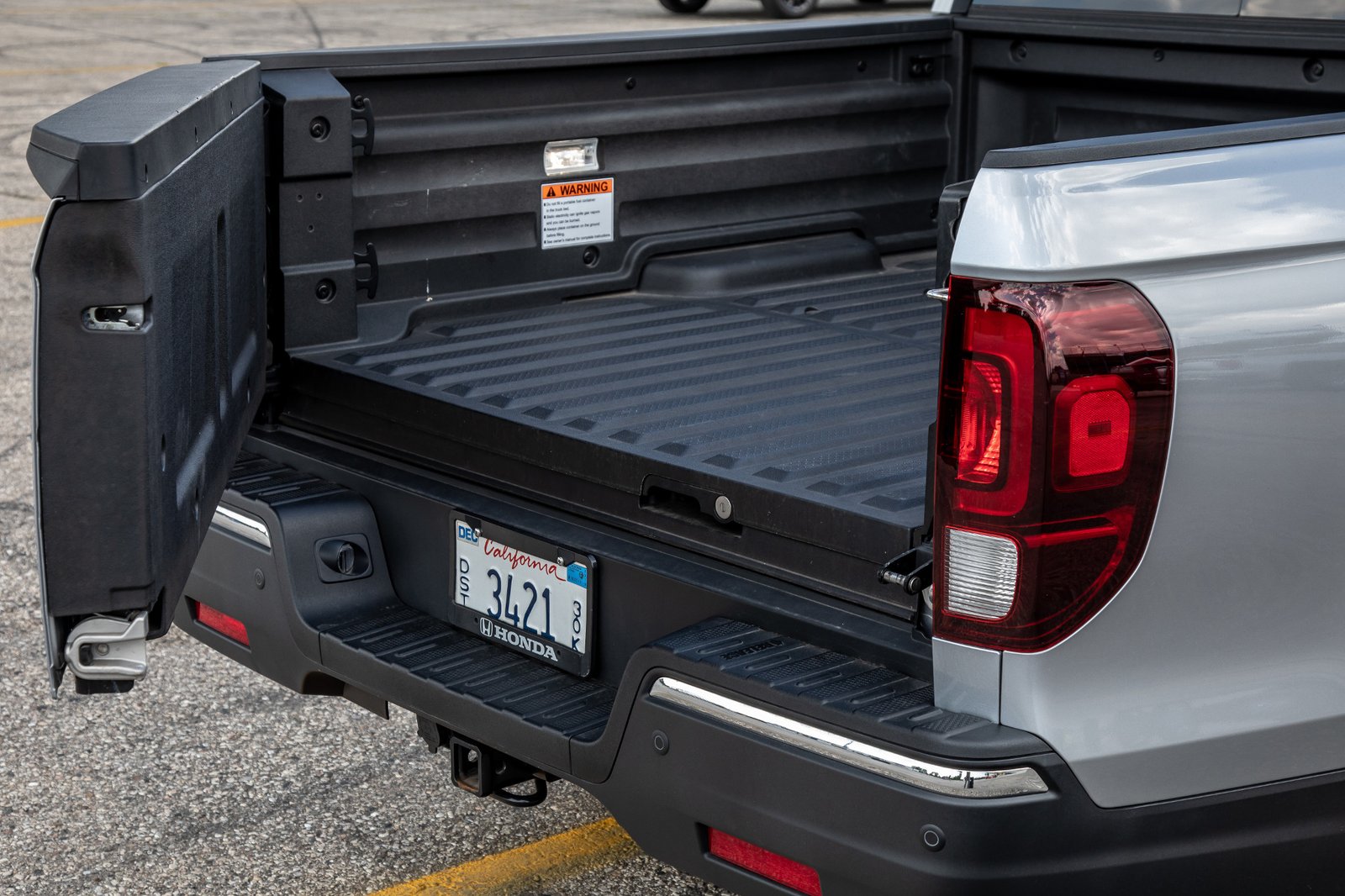 honda-ridgeline-2019-23-exterior--rear--silver--tailgate.jpg