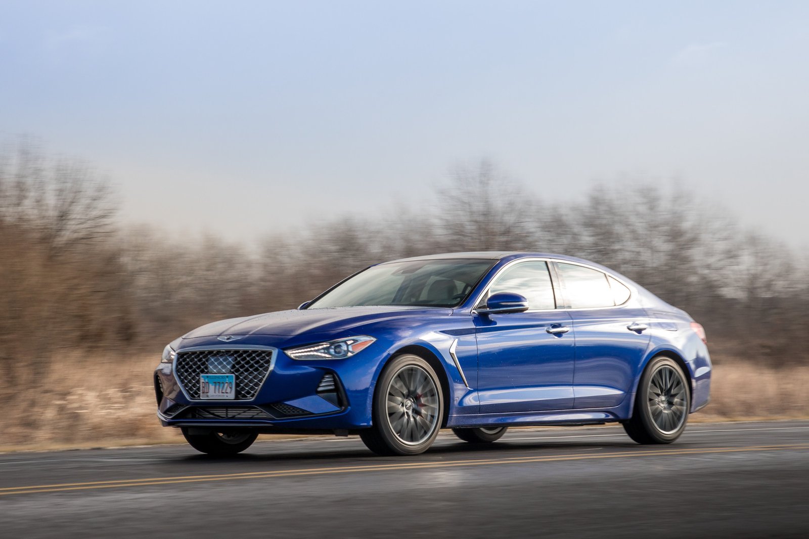 07-genesis-g70-2019-angle--autumn--blue--dynamic--exterior--front--rural.jpg