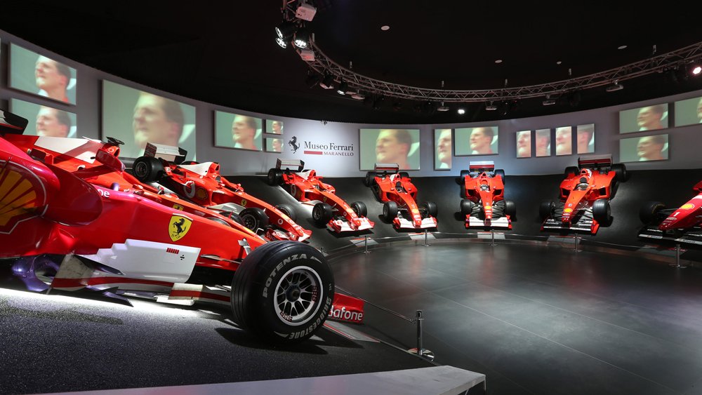 A display of Michael Schumacher's race cars.