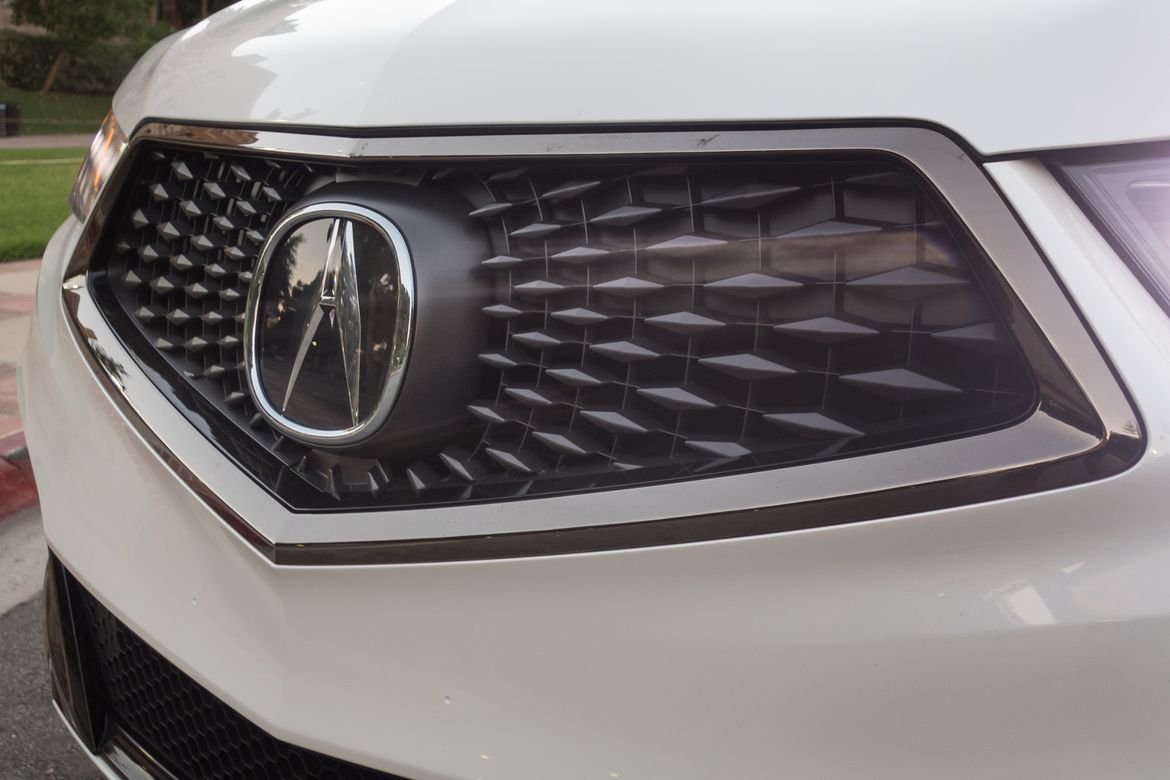 06-acura-mdx-a-spec-2019-badge--exterior--grille--white.jpg