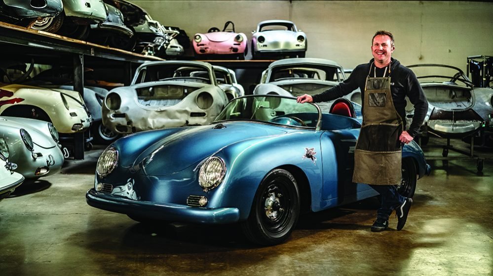 Rod Emory in his shop next to one of his creative restorations;