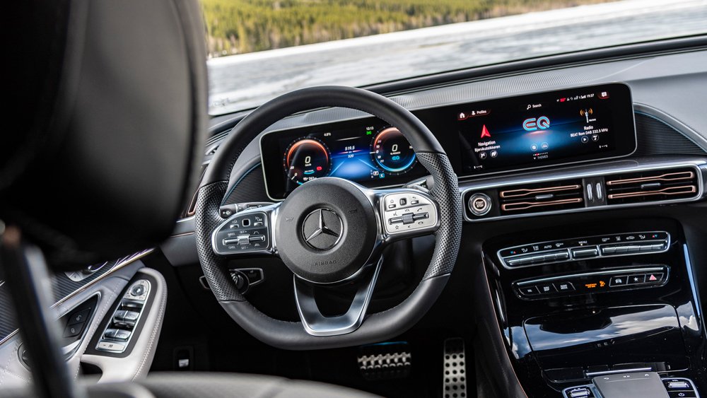 The dash features two widescreen displays of Mercedes' MBUX user interface.