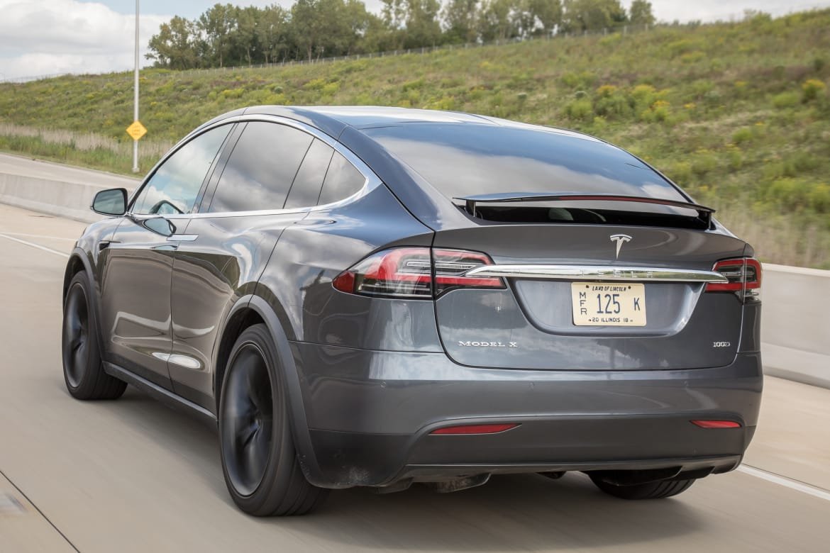 02-tesla-model-x-2018-dynamic--exterior--grey--rear-angle.jpg