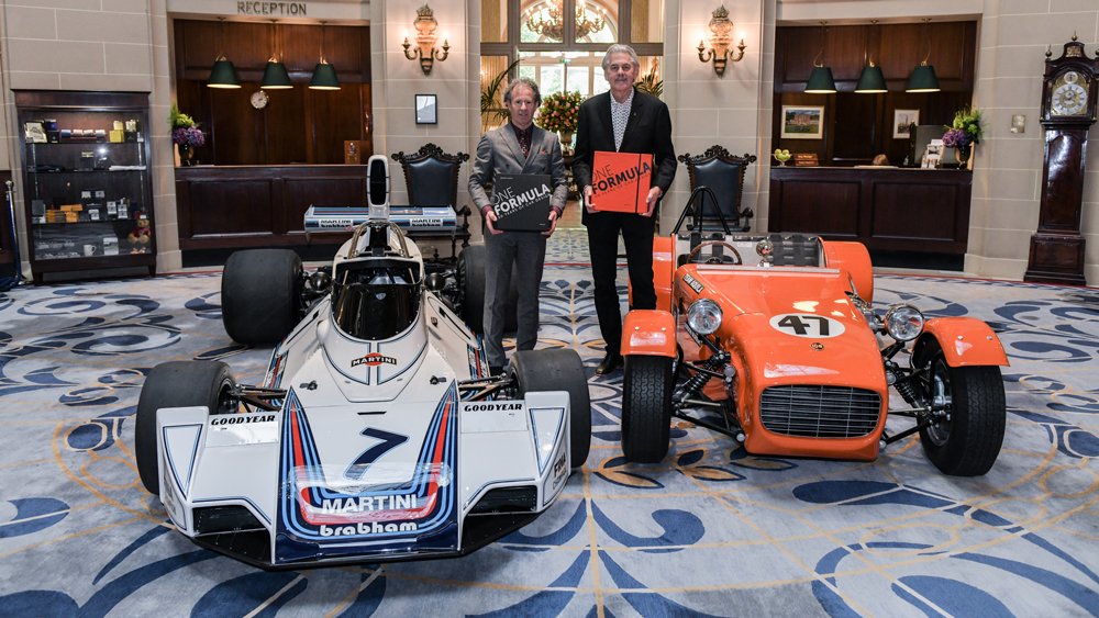 Gordon Murray (right) and Phillip Porter with One Formula: 50 Years of Car Design.