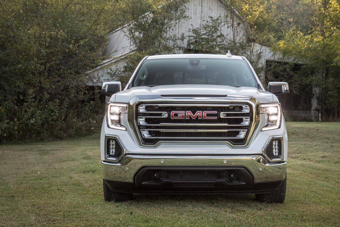 12-gmc-sierra-1500-crew-cab-slt-2019-exterior--front--rear-angle