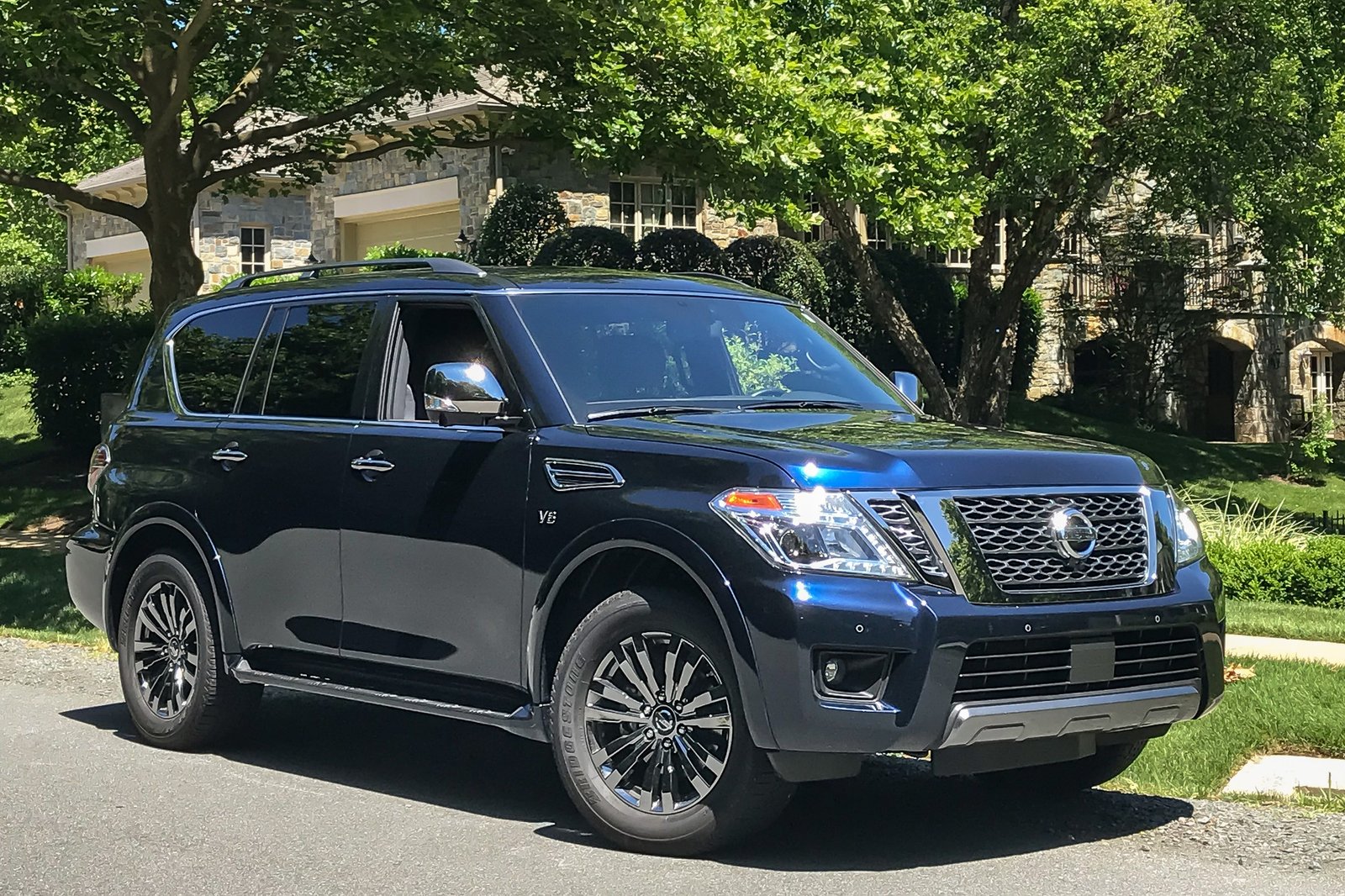 nissan-armada-platinum-reserve-2019-01-angle--blue--exterior--front.jpg