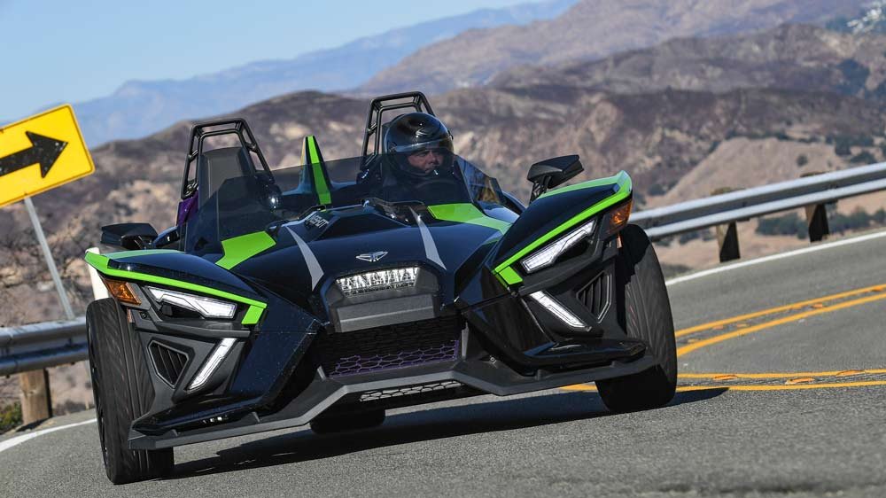 The 2021 Polaris Slingshot SL on a canyon road above Malibu.