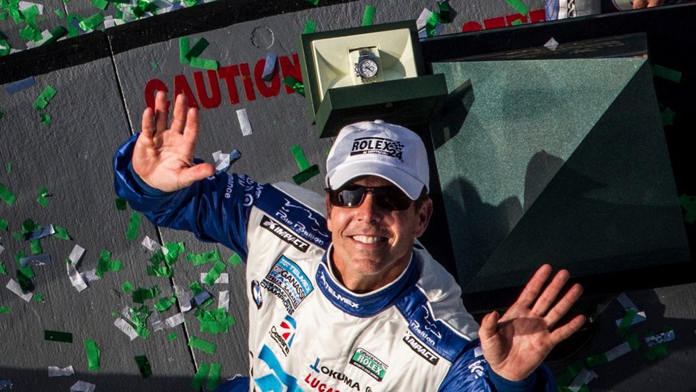 Scott Pruett on the podium after the 2013 Rolex 24 at Daytona.