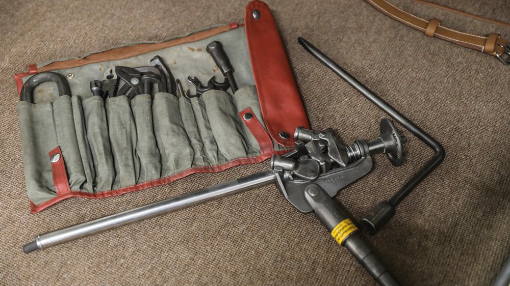 The tool kit and roadside jack that accompanies a 1963 Mercedes-Benz 300 SL Roadster.