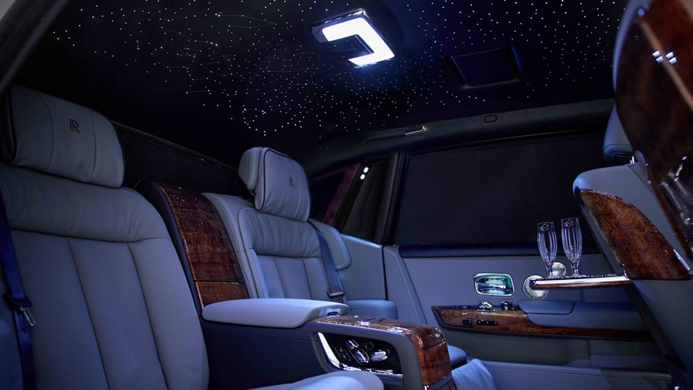A bespoke Rolls-Royce Phantom with an interior that features Hawaiian Koa wood.