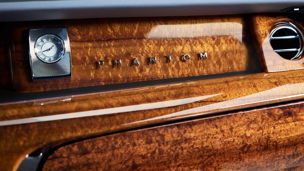 A bespoke Rolls-Royce Phantom with an interior that features Hawaiian Koa wood.