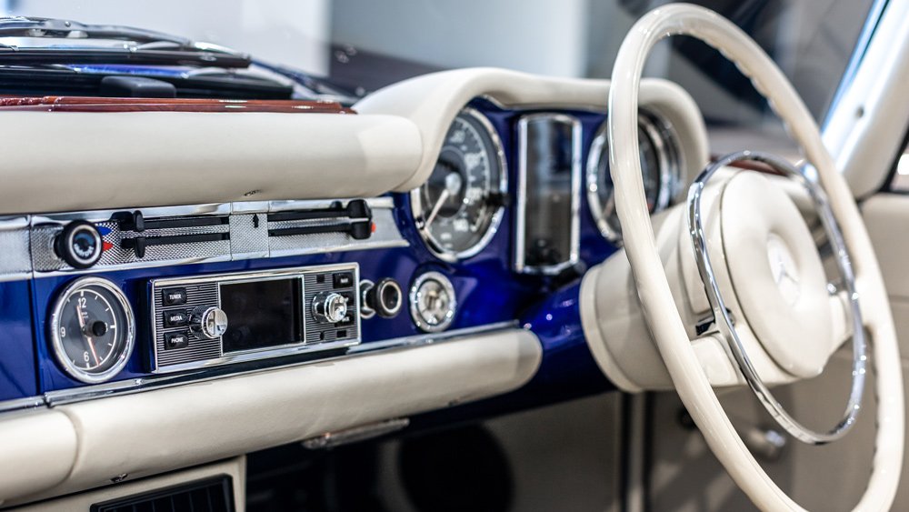 The interior dash of an electric Mercedes-Benz 280SL