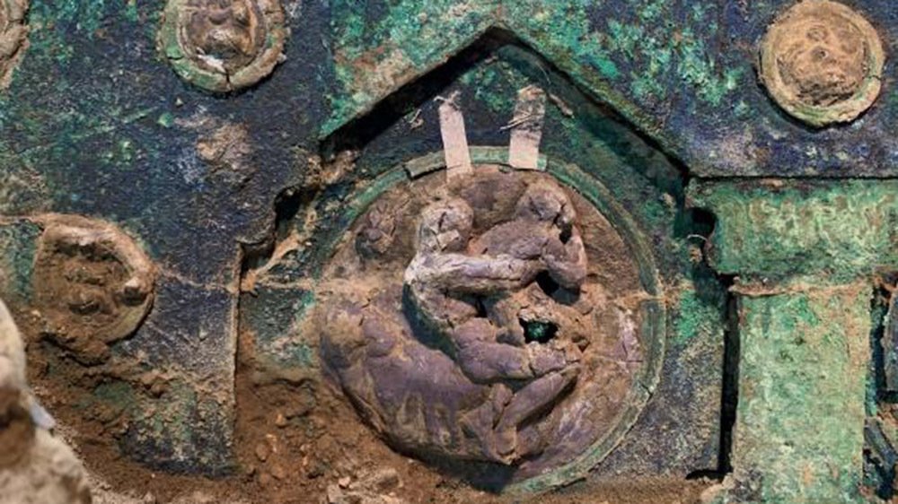 A closeup of the chariots bronze and tin decorations