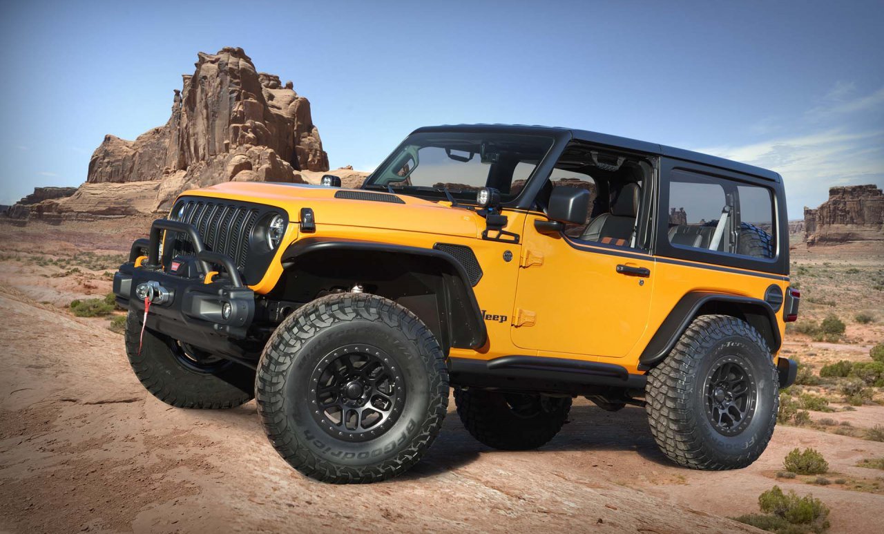 Based on a two-door Wrangler, the Jeep® Orange Peelz concept pays tribute to the long-standing, open-air, fun-and-freedom lifestyle that makes the Jeep Wrangler a global icon. Mopar designers have vastly enhanced the Wrangler’s open-air heritage by removing side and rear windows, installing prototype JPP half doors and a custom removable one-piece Freedom Top glass sunroof.