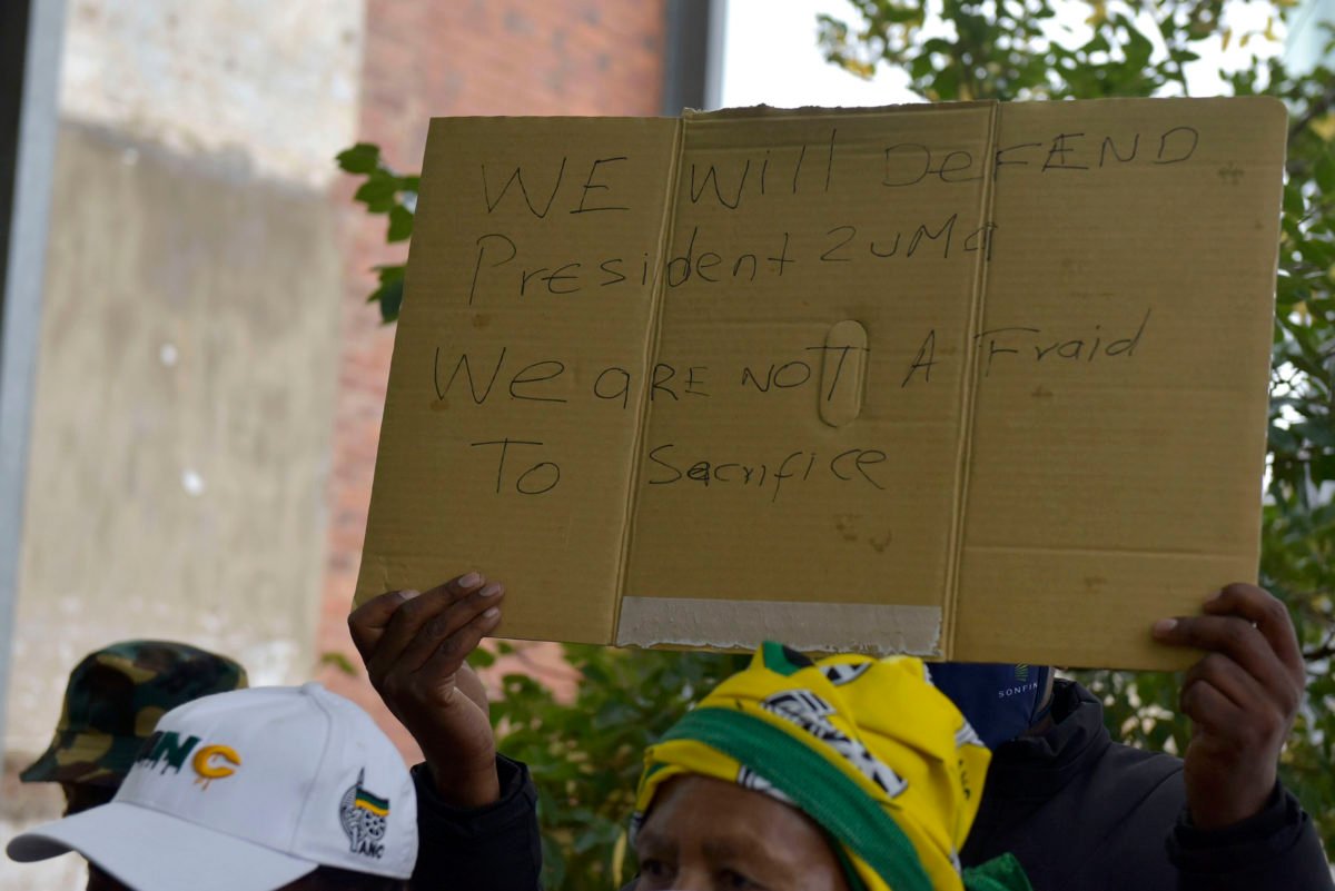 Pro Zuma supporters outside the Constitutional Court in Braamfontein, 25 March 2021. A group of ANC members protested in support of Zuma ahead of the courts desision on whether he was in contempt of a previous ruling, whilst a bigger group of protestors from Action SA and Move One Million counter protested. Picture: Neil McCartney