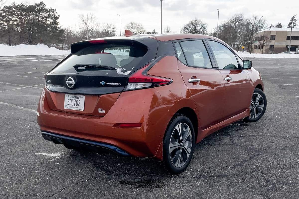 nissan-leaf-sl-plus-2021-10-angle--exterior--orange--rear.jpg