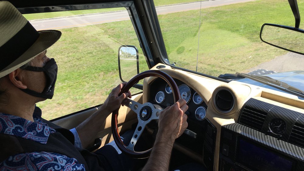 Piloting the all-electric Range Rover Classic on the roads of Kissimmee, Fla.
