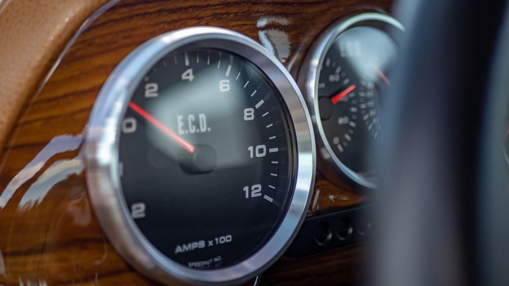 A gauge on the dash of E.C.D. Automotive Design's all-electric Range Rover Classic.