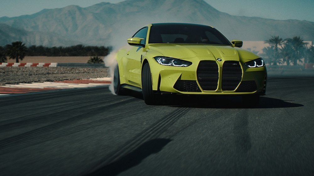 A BMW M4 drifts at the Thermal Club's private racetrack.