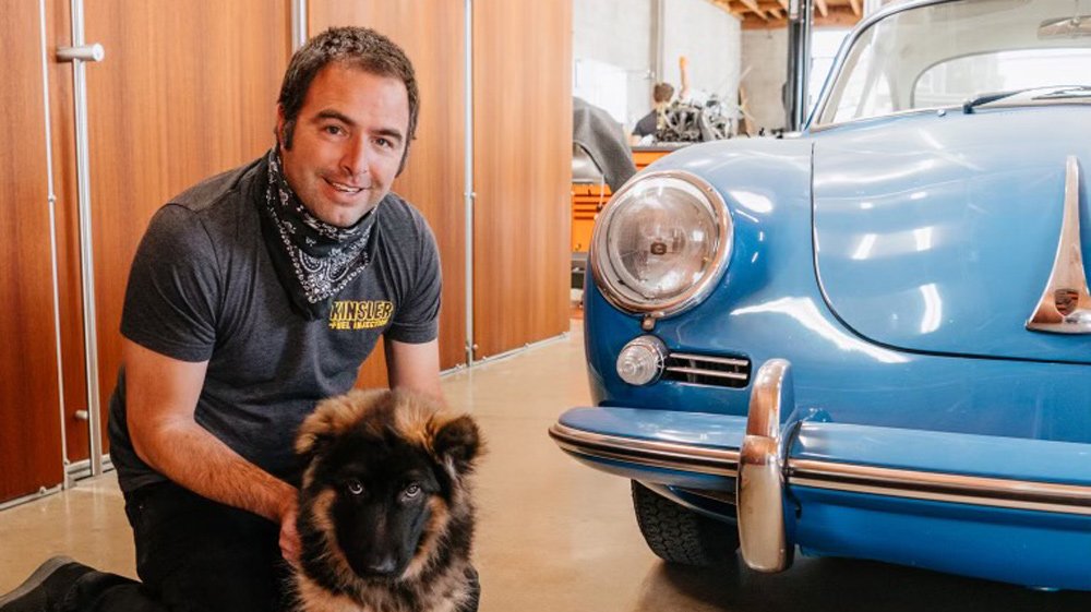 Marlon Goldberg, founder of automotive custom house Workshop 5001, and his dog Zander.