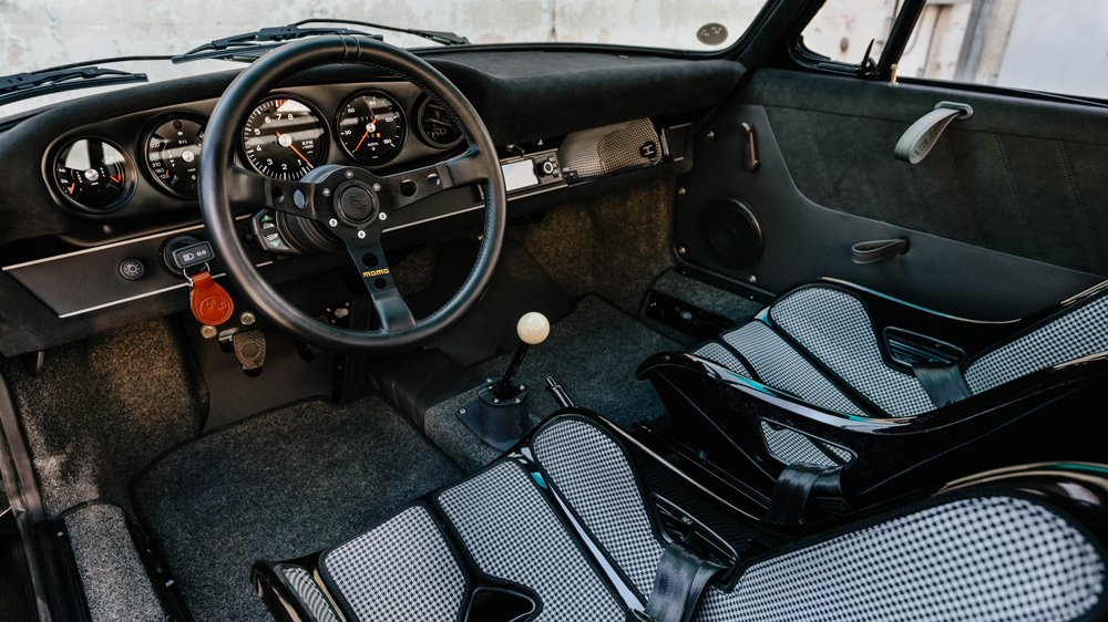 The interior of a 1968 Porsche restomod from Workshop 5001.