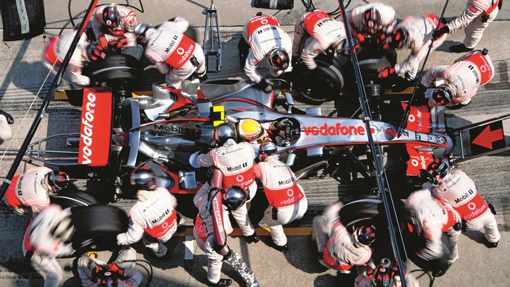 Racer Lewis Hamilton takes a pit stop during the second race of his rookie season in 2007.