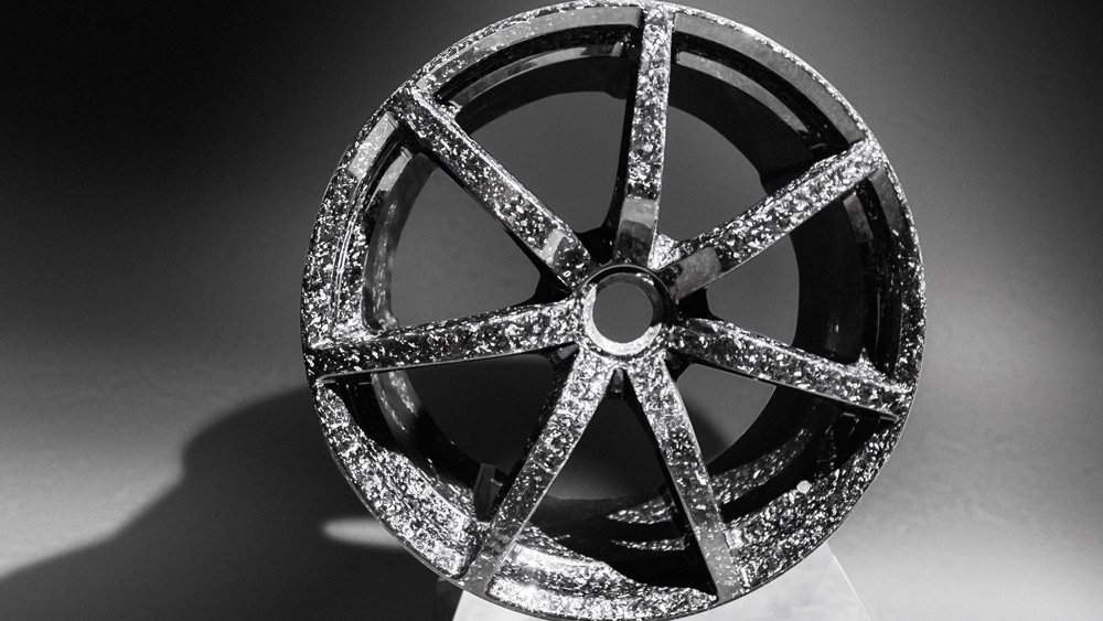 Each Zenvo carbon-fiber wheel features 550 hand-layered pieces and takes a craftsman two weeks to create.