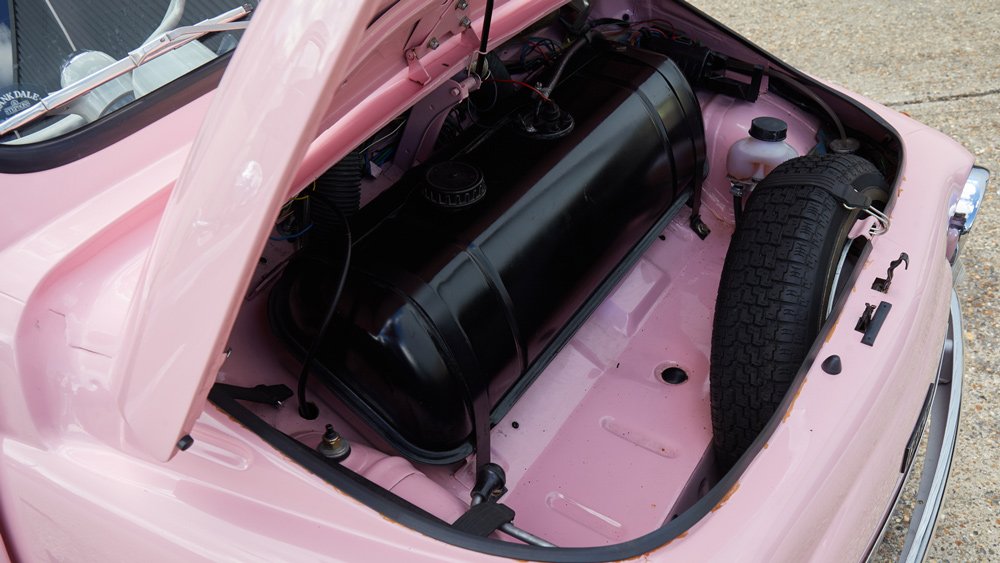 A look under the hood of an immaculately restored 1974 Fiat Cinquecento.