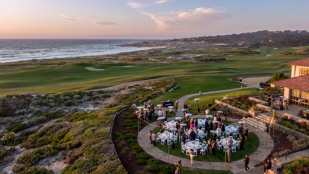 Dining at dusk on the lawn of the Inn at Spanish Bay in Pebble Beach.