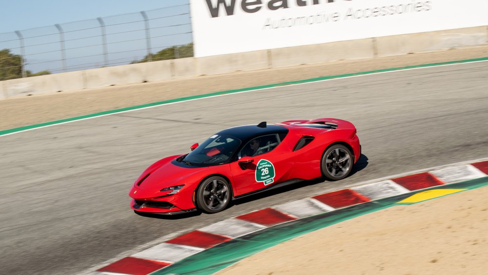 Edward Walson and his 2021 Ferrari SF90 Stradale entering the Corkscrew at Weathertech Raceway Laguna Seca.