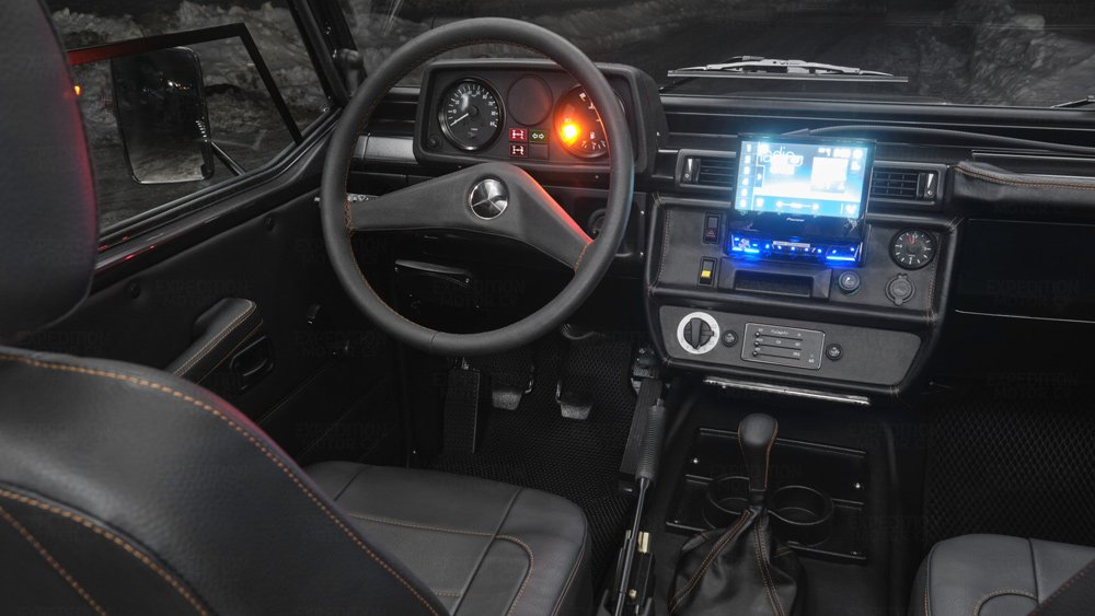 The interior of a Mercedes-Benz G-Wagen Wolf restomod from Expedition Motor Company.