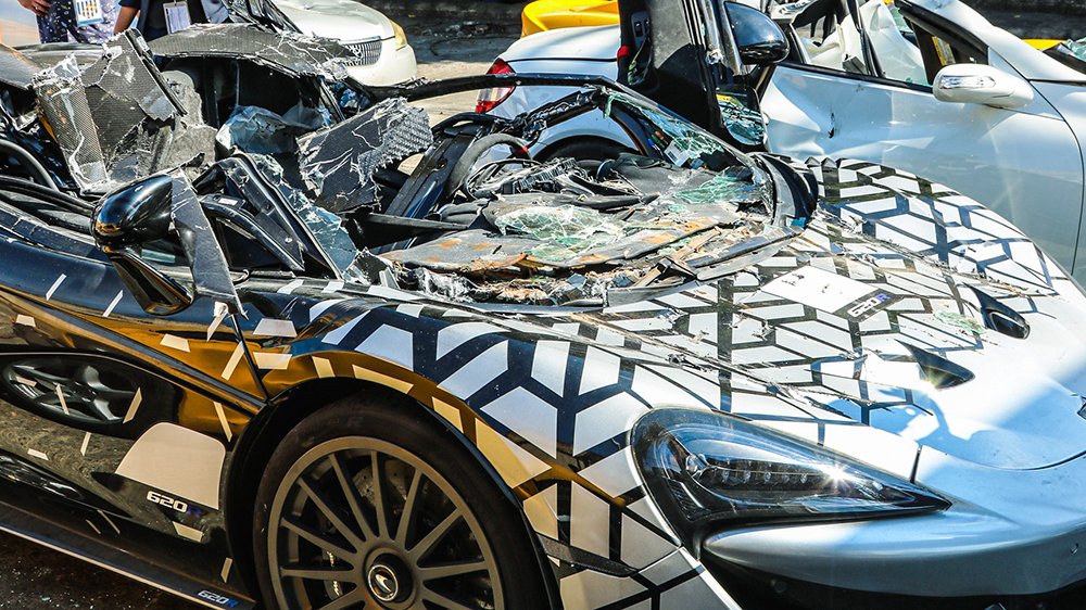 A closeup of the destroyed McLaren 620R