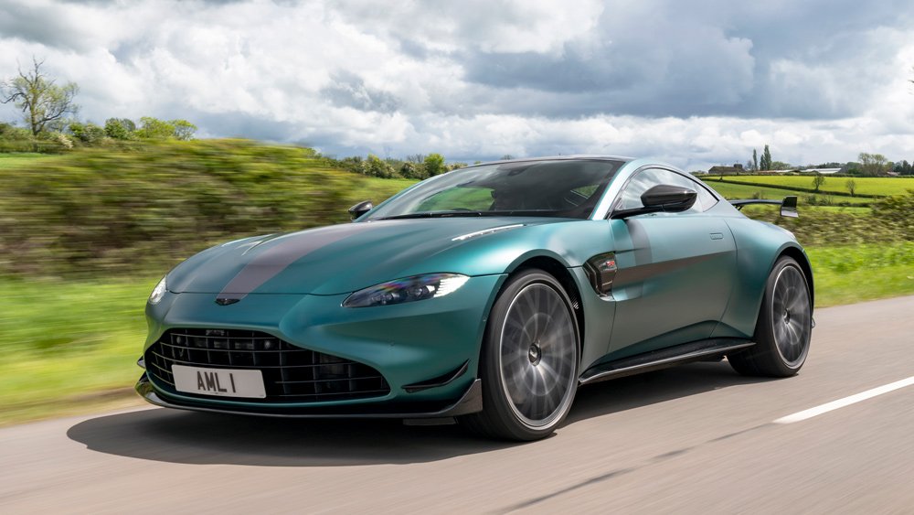 The Aston Martin Vantage F1 Edition cruising through the English countryside.