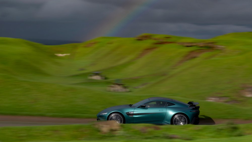 The Aston Martin Vantage F1 Edition cruising through the English countryside.