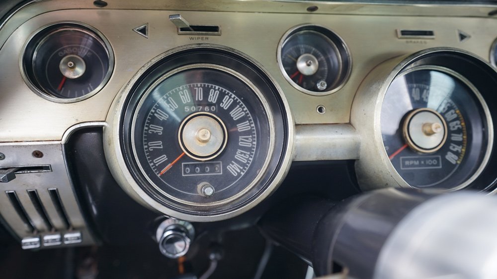 The dashboard of an unrestored 1967 Shelby GT500.