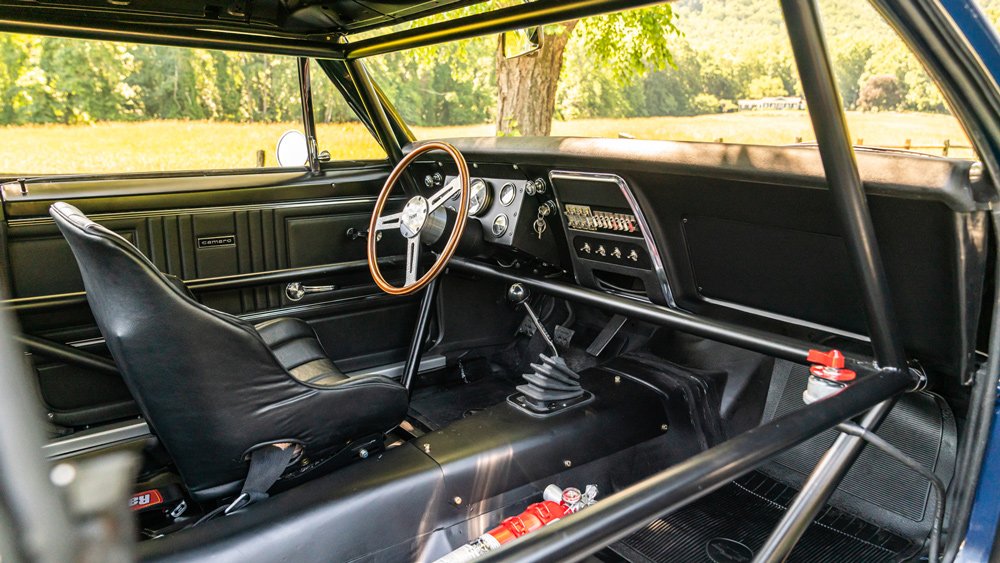 The race-focused cockpit of a 1967 Chevrolet Camaro Z/28 Trans Am.