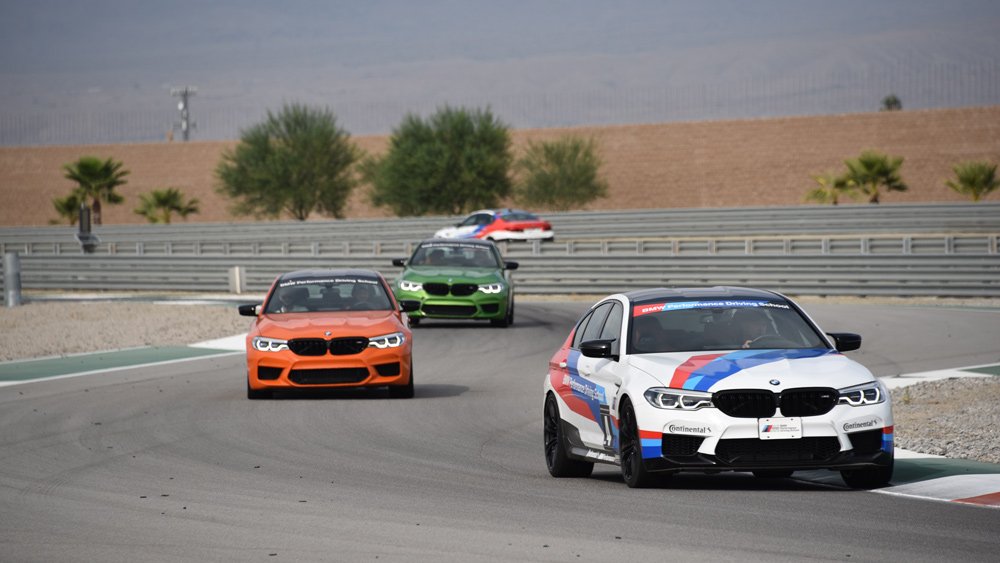 BMWs on the track at the Thermal Club in Thermal, Calif.