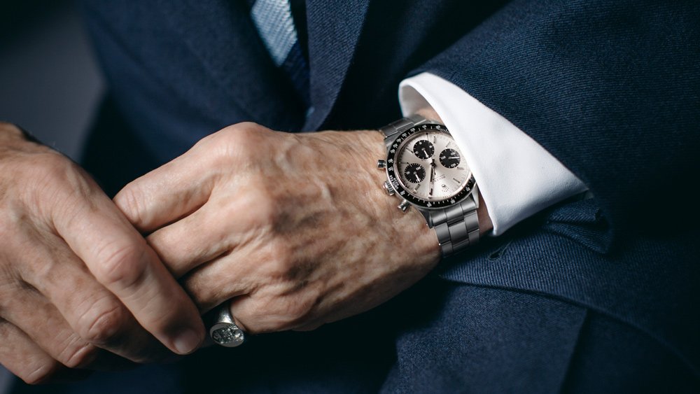 Sir Jackie Stewart, former racer and current Rolex Testimonee, wearing a Rolex Oyster Perpetual Cosmograph Daytona timepiece.
