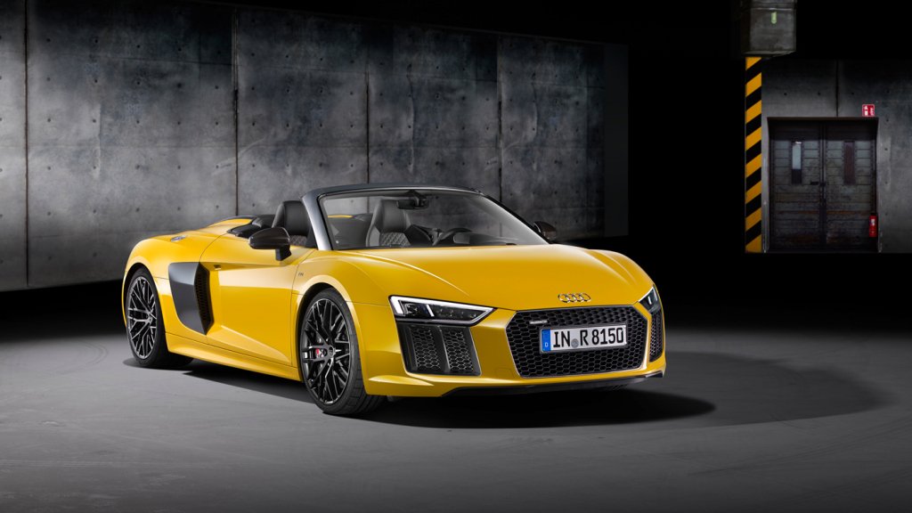 The 540 hp Audi R8 V10 Spyder with 7-speed dual-clutch transmission and Quattro all-wheel drive.