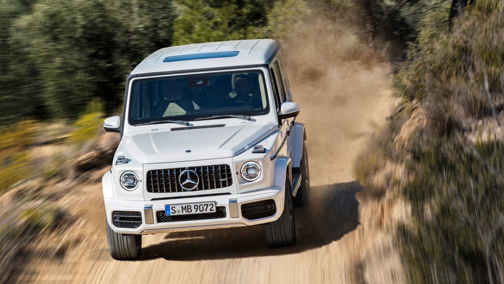 A 2019 Mercedes-AMG G63 on a dirt road.