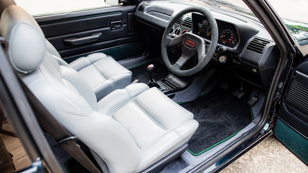 The interior of Tolman Motorsport's Peugeot 250 GTI restomod.