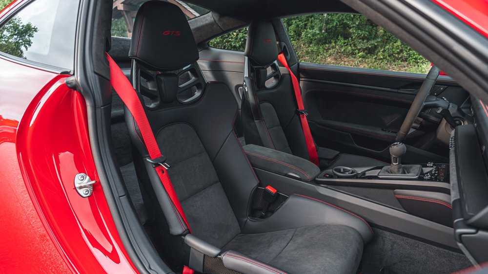 The cockpit of a 2022 Porsche 911 GTS.