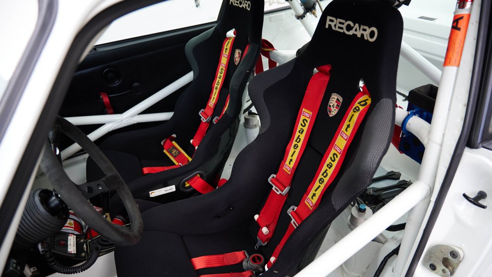 The interior of a 1995 Porsche 911 Cup 3.8 RSR Evo race car.