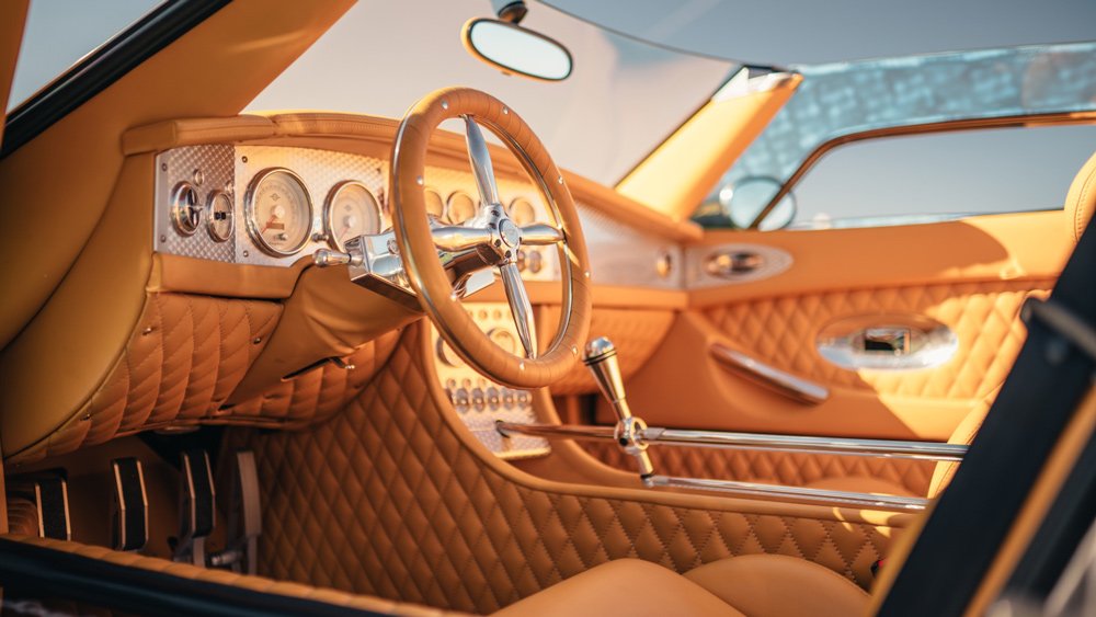 The interior of a Spyker C8 sports car.