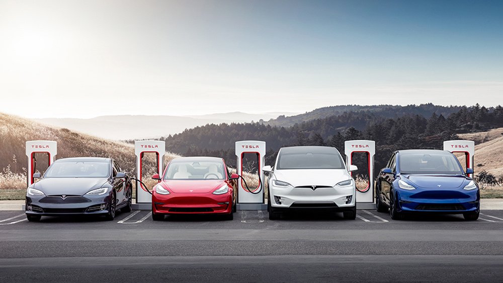 Examples of the ubiquitous Tesla plugging into the EV power grid.
