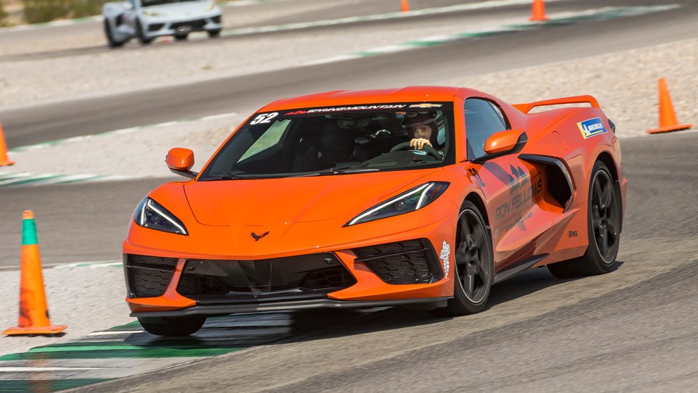 Driving a C8 Corvette at the Ron Fellows Performance Driving School.