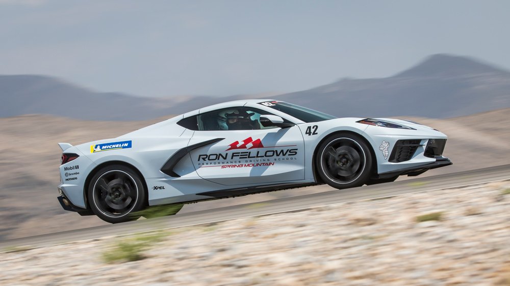 Driving a C8 Corvette at the Ron Fellows Performance Driving School.