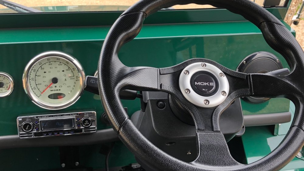The dash of the Moke automobile by Moke International.