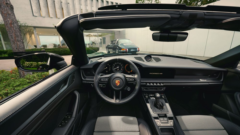 The interior of the 911 Porsche Design 50th Anniversary Edition sports car.