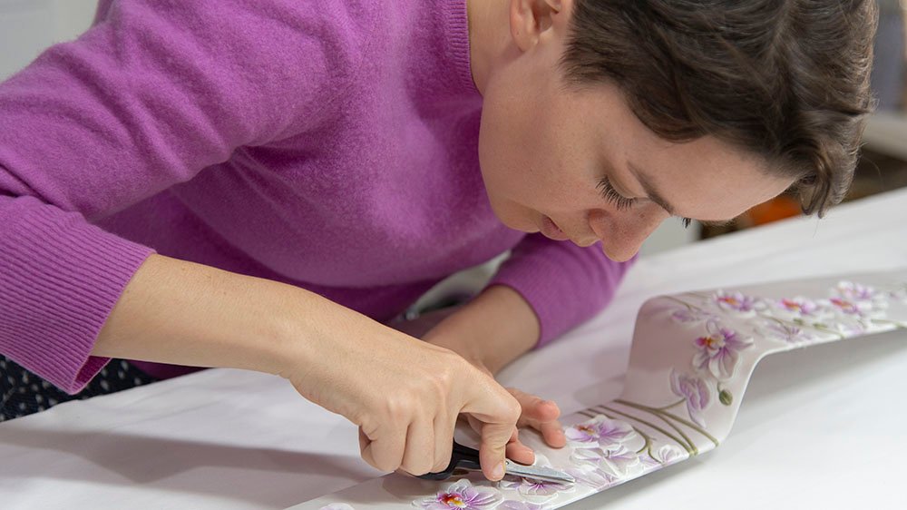 Artist Helen Amy Murray hand-sculpting the silk flowers for the Phantom Orchid
